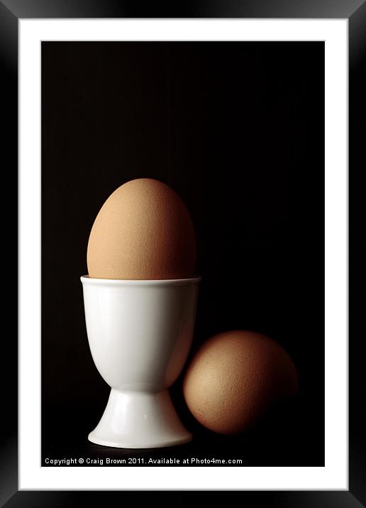 Brown Eggs in Egg Cup Framed Mounted Print by Craig Brown