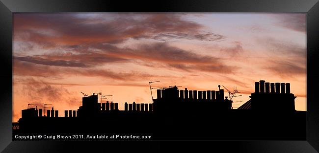Silhouetted Rooftops at Dusk Framed Print by Craig Brown