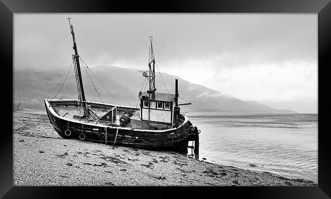 Beached fishing boat Framed Print by Gary Eason