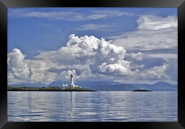 Summer clouds over Eilean Musdile lighthouse light Framed Print by Gary Eason