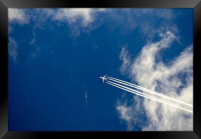 Airliner passing  overhead Framed Print by Gary Eason