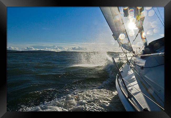 Sunlit bow spray Framed Print by Gary Eason