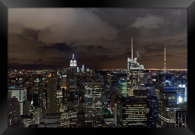 New York skyline at night Framed Print by Gary Eason