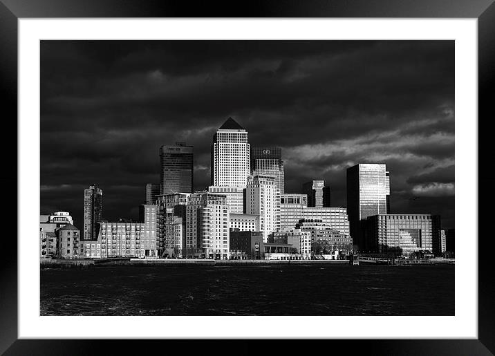 Canary Wharf sunlit from the Thames B&W version Framed Mounted Print by Gary Eason