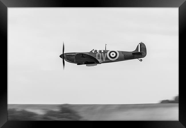 Spitfire low-level flying black and white version Framed Print by Gary Eason