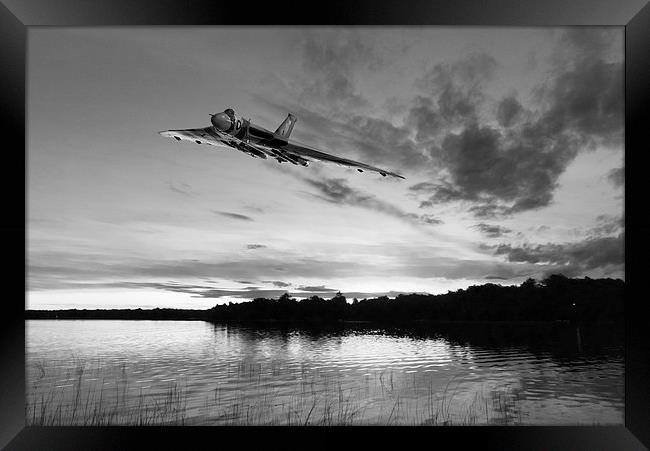 Vulcan low over a sunset lake sunset lake B&W vers Framed Print by Gary Eason