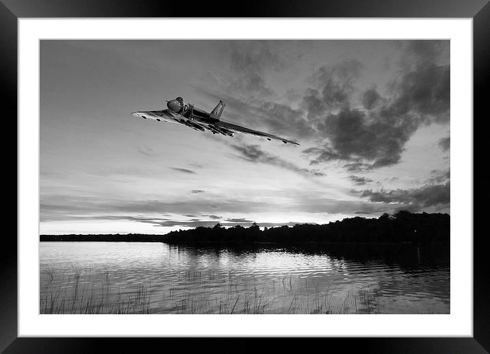 Vulcan low over a sunset lake sunset lake B&W vers Framed Mounted Print by Gary Eason