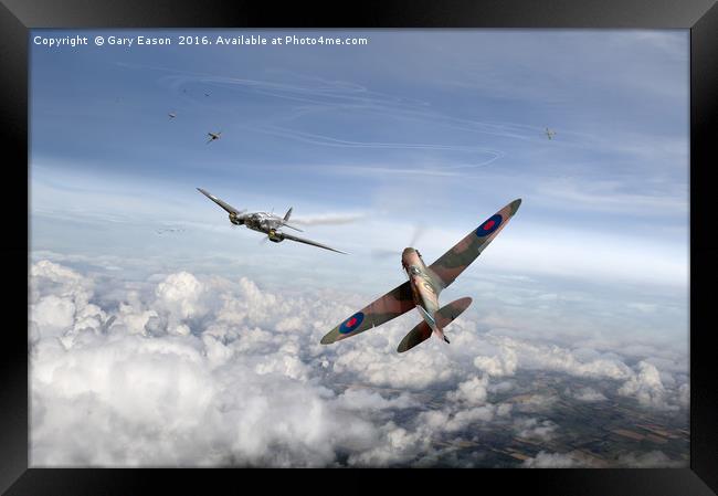 Spitfire attacking Heinkel bomber Framed Print by Gary Eason