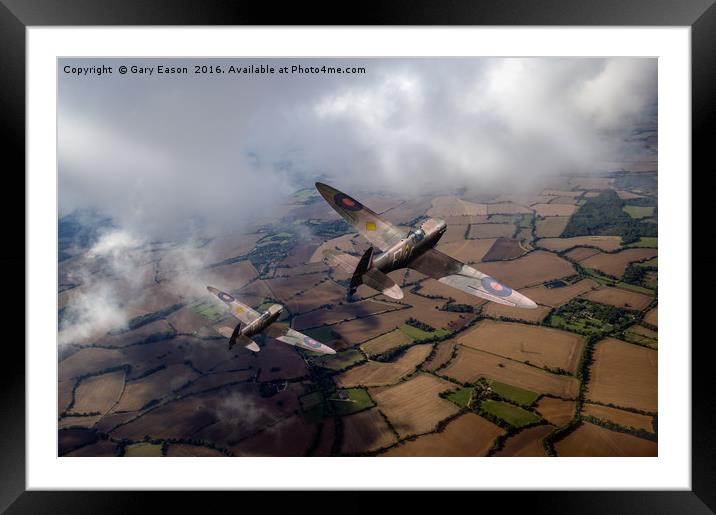 Spitfires among low clouds Framed Mounted Print by Gary Eason