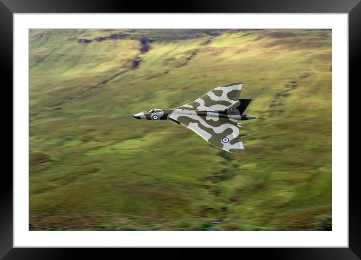 Vulcan B2 low-level against hillside Framed Mounted Print by Gary Eason