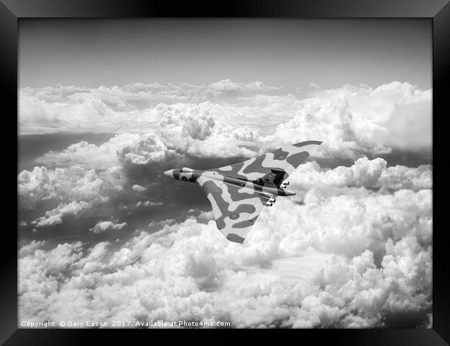 Vulcan above majestic clouds B&W version Framed Print by Gary Eason