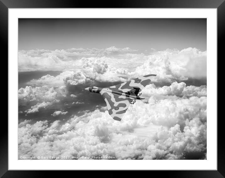 Vulcan above majestic clouds B&W version Framed Mounted Print by Gary Eason