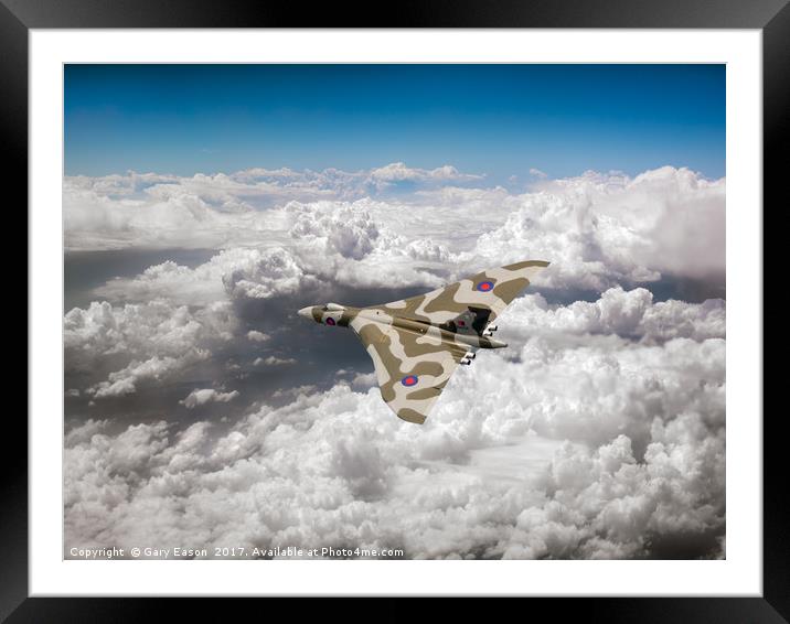 Vulcan above majestic clouds Framed Mounted Print by Gary Eason