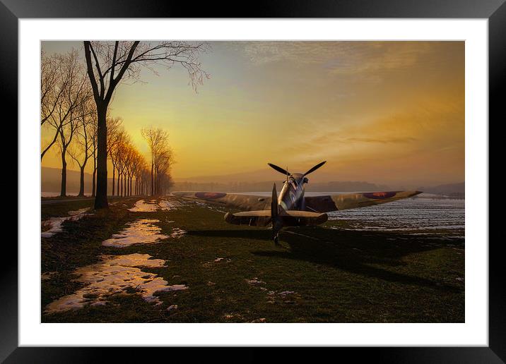 Spitfire in winter Framed Mounted Print by Gary Eason
