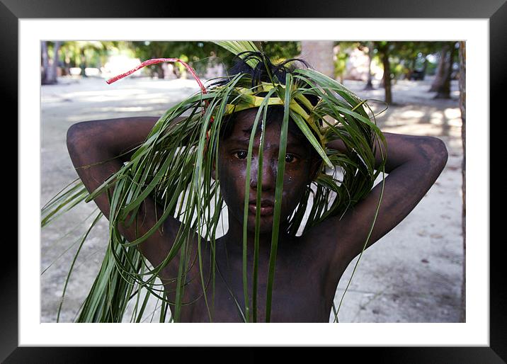 boy in disquise Framed Mounted Print by Hassan Najmy