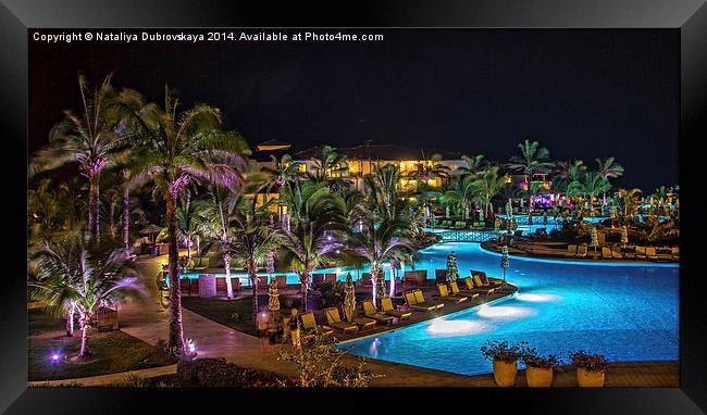 Evening picture of the swimming pool area on a res Framed Print by Nataliya Dubrovskaya