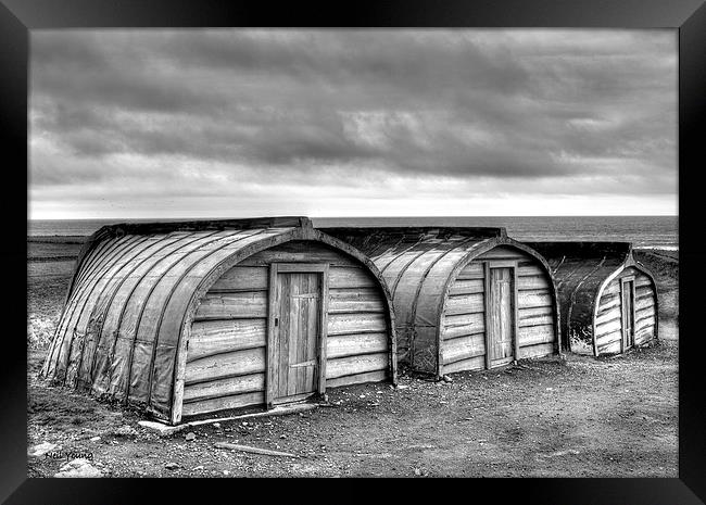 Lindisfarne Boat Huts Framed Print by Neil Young