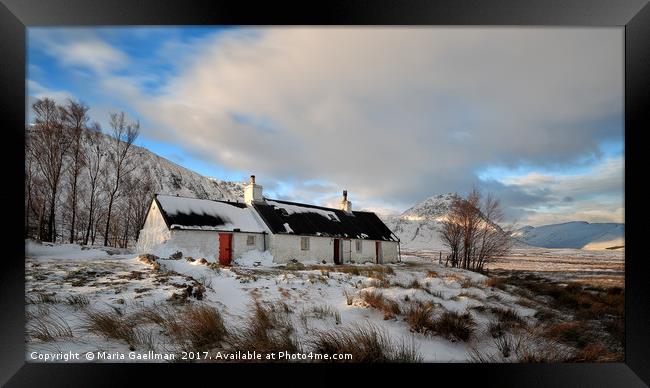 Blackrock Cottage in Winter Framed Print by Maria Gaellman
