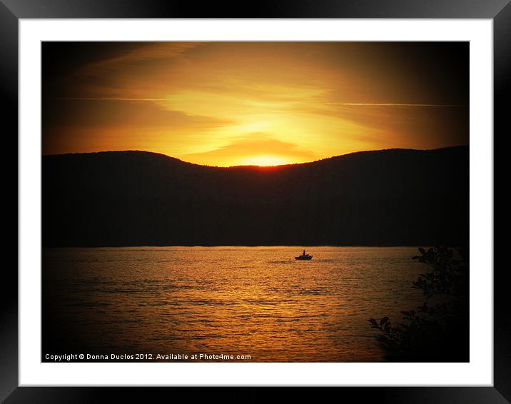 Boater in the sunset Framed Mounted Print by Donna Duclos