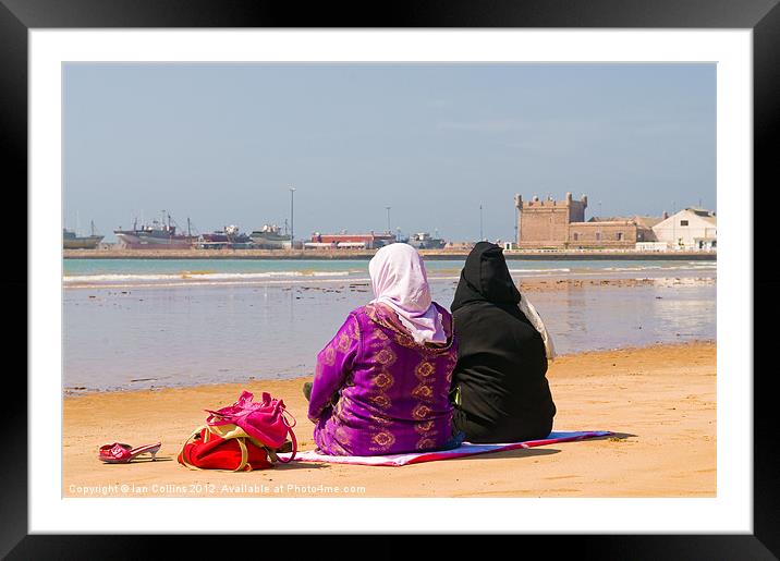 Moroccan women on beach Framed Mounted Print by Ian Collins