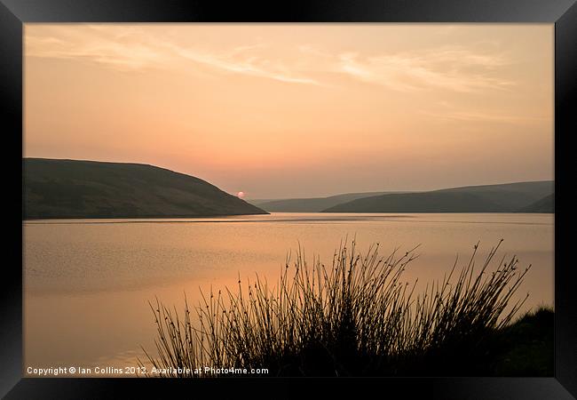Sunset over the Claerwen reservoir Framed Print by Ian Collins