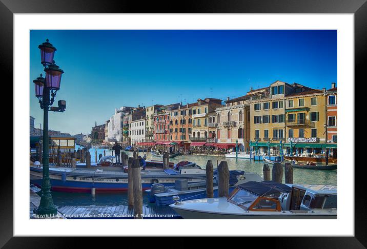 Moored on a Venice canal Framed Mounted Print by Angela Wallace