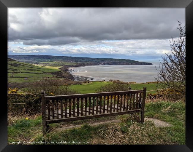 Bench with a view of Robin Hoods Bay Framed Print by Angela Wallace