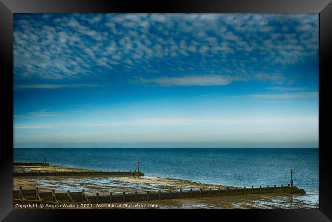 Groynes at Silloth Cumbria Framed Print by Angela Wallace