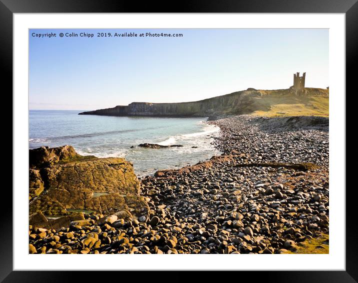 Dunstanburgh in Spring sunshine Framed Mounted Print by Colin Chipp