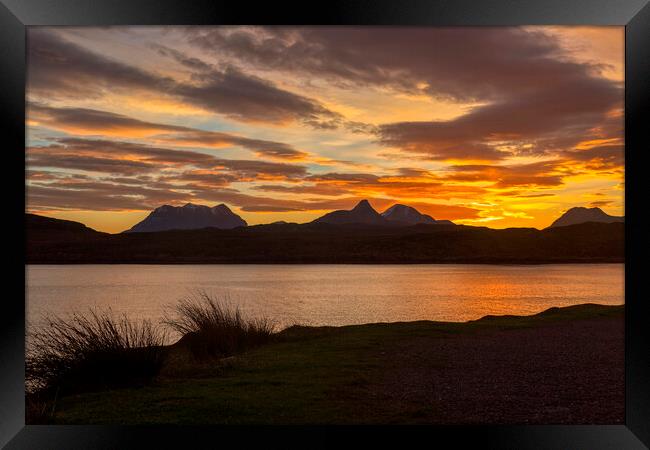 Radiant Silhouette of Assynt and Coigach Mountains Framed Print by Derek Beattie