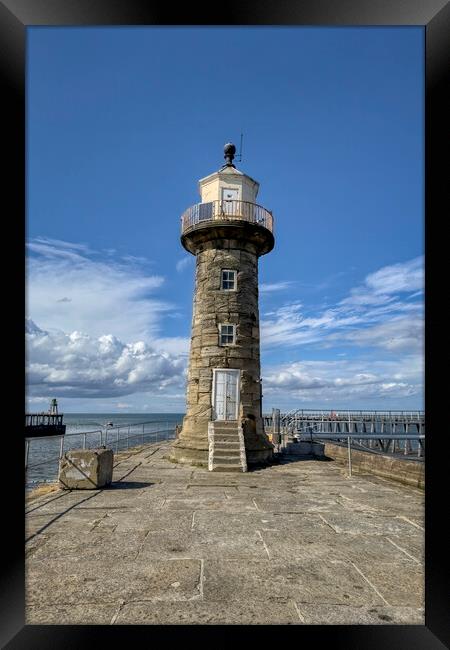 Whitby East Pier Lighthouse Framed Print by Derek Beattie
