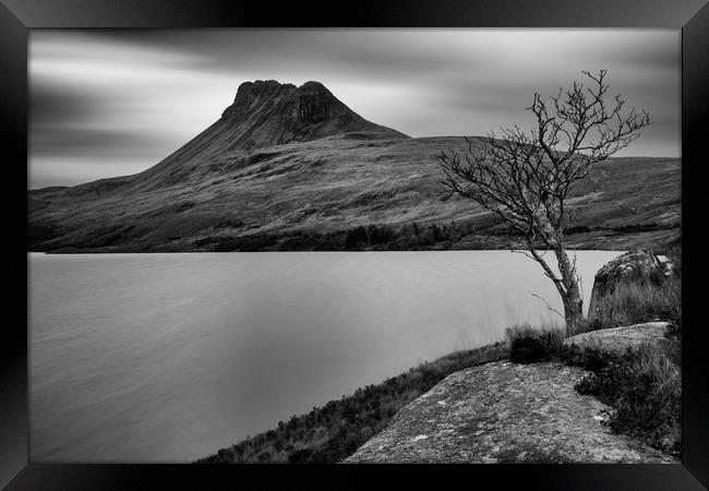 Stac Pollaidh across Loch Lurgainn Framed Print by Derek Beattie