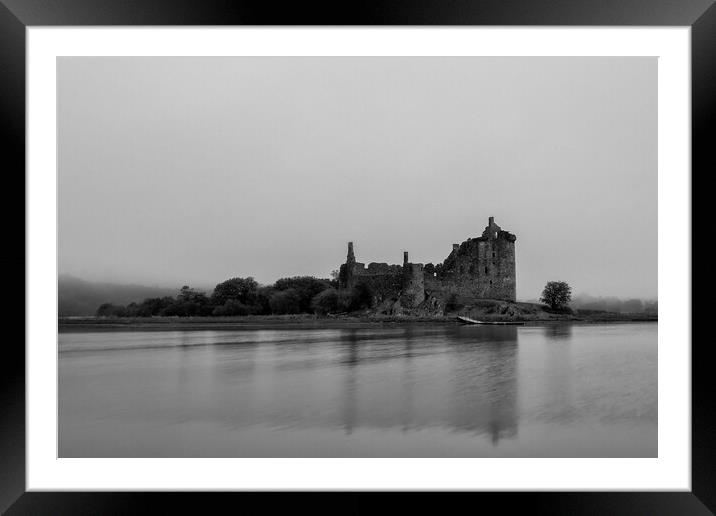 Kilchurn Castle in the Mist Framed Mounted Print by Derek Beattie