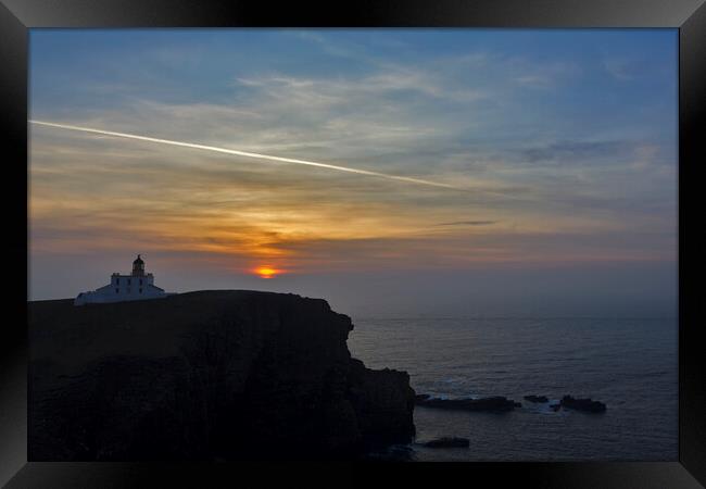 Stoer Head Lighthouse at Sunset Framed Print by Derek Beattie