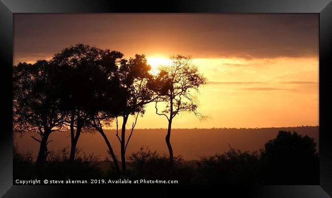     Sunset in the Masai Mara in June.              Framed Print by steve akerman
