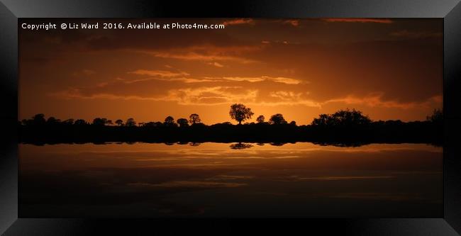 Reflective sunset Framed Print by Liz Ward