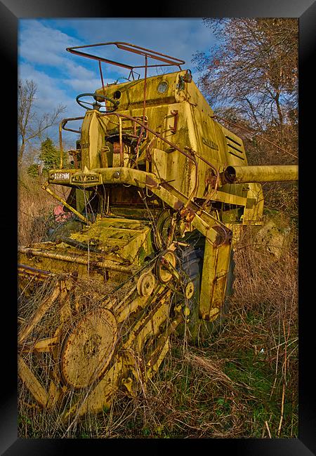 retired combine harvester Framed Print by Jo Beerens