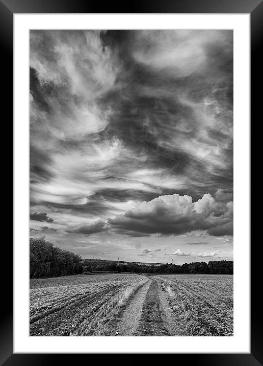 cloudy skies Framed Mounted Print by Jo Beerens