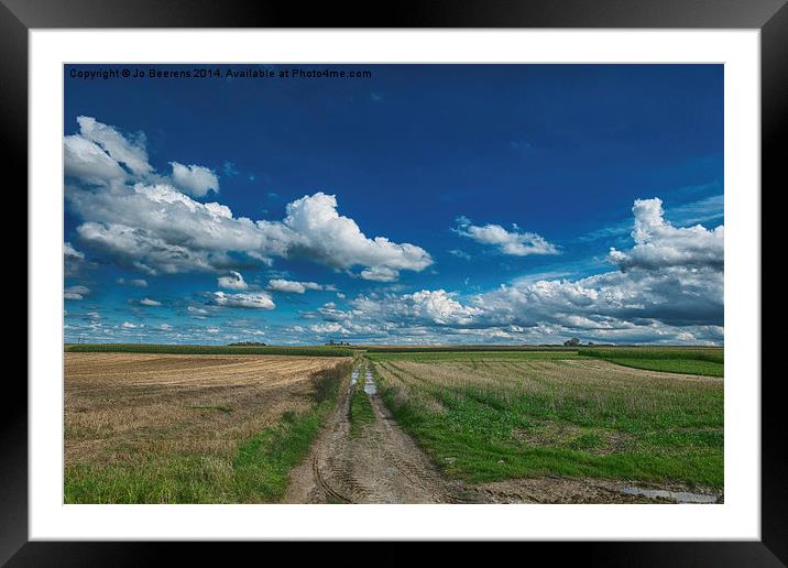 drifting clouds Framed Mounted Print by Jo Beerens