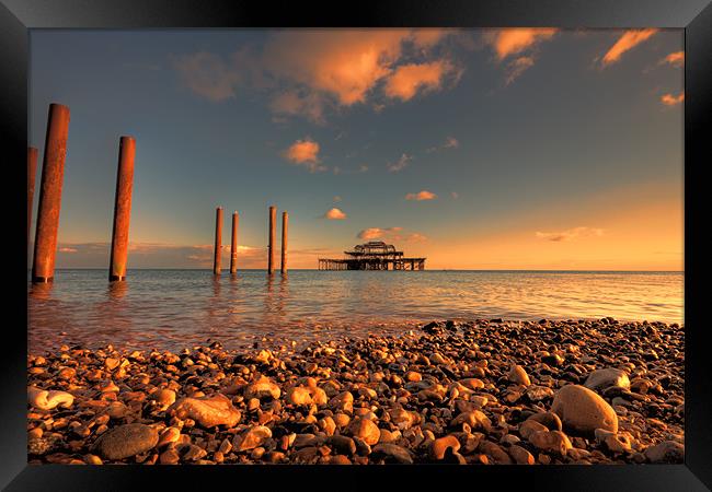 Brighton West Pier at Sunset Framed Print by Dean Messenger