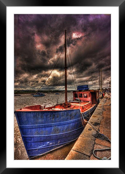 Old Boat in a storm Framed Mounted Print by Dean Messenger