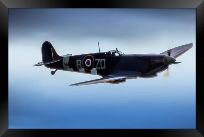 Spitfire in Flight Framed Print by Dean Messenger