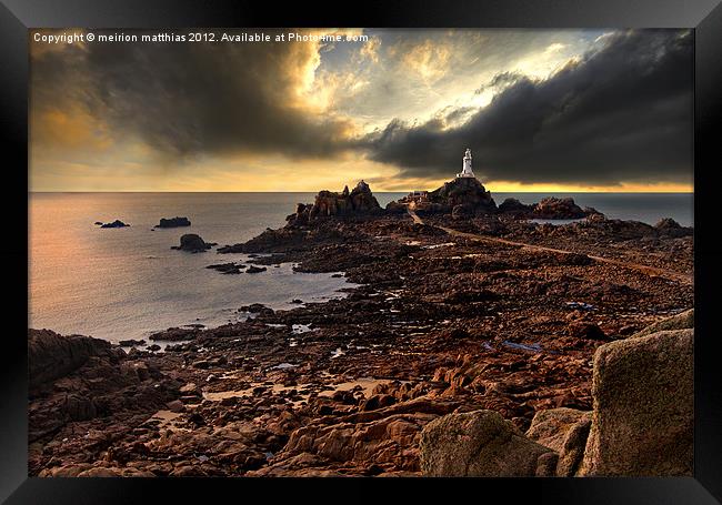 moody at La Corbiere lighthouse Framed Print by meirion matthias