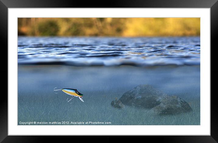 fishing lure in use Framed Mounted Print by meirion matthias