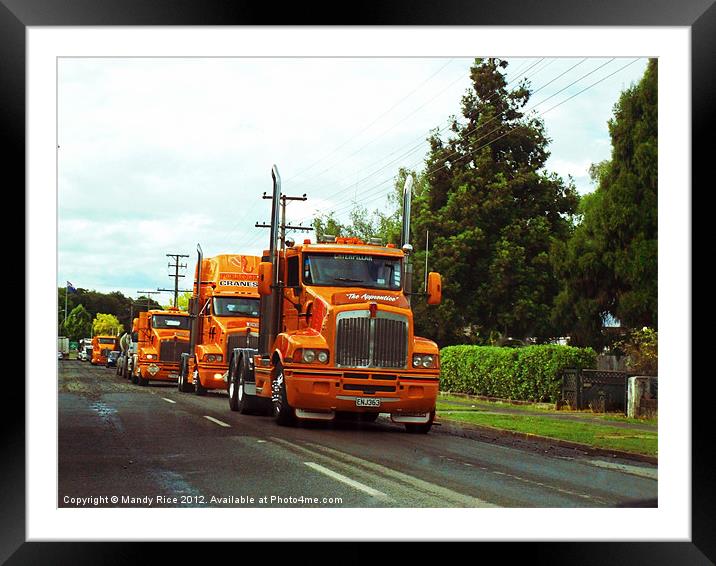 Orange trucks in a row Framed Mounted Print by Mandy Rice