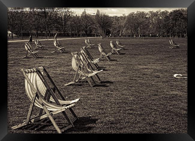 Deckchairs Framed Print by Neal P