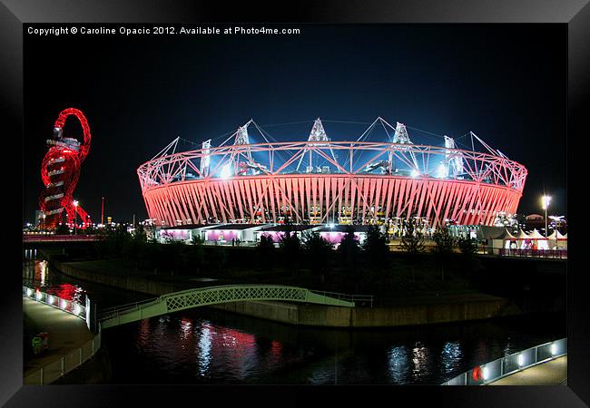 Olympic Stadium by night Framed Print by Caroline Opacic