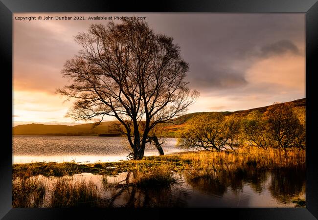 Sunrise on Loch Freuchie Framed Print by John Dunbar