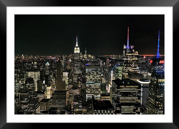 Manhattan At Night Framed Mounted Print by Phil Clements