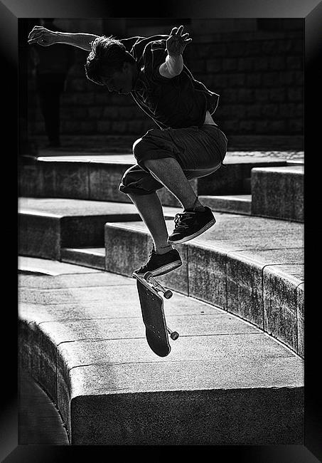 Urban jump Framed Print by paul cowles